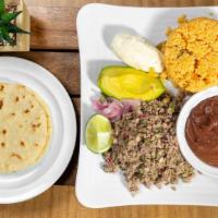 Plato Salpicón  · Combination of minced beef, radish, onion, and mint. Served with rice, refried beans, salvad...