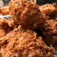 Thigh · Buttermilk fried chicken thigh lightly drizzled with honey before serving. 

Select 