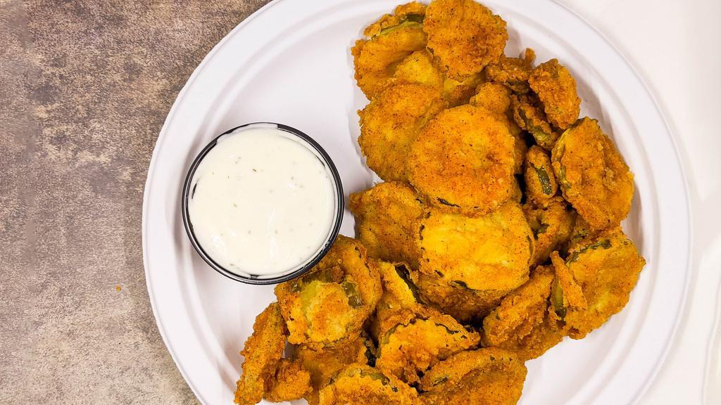 Fried Pickles · Seasoned crispy pickle chips with ranch dipping sauce