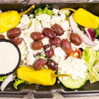Greek Salad · Gluten Free. Fresh mixed greens, feta cheese, tomatoes, cucumbers, kalamata olives, red onio...
