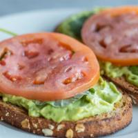Avocado Toast · Homemade avocado spread with tomato, baby kale, and fresh multi-grain bread.