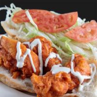 Buffalo Chicken Sandwich · With blue cheese, lettuce and tomato.