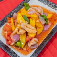 Mango Chicken · Fresh season mango sautéed with white meat chicken, snow peas, green and red peppers in a sw...