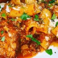 Sunday Gravy · Rigatoni served with a meatball & sausage.  (CONTAINS PORK)