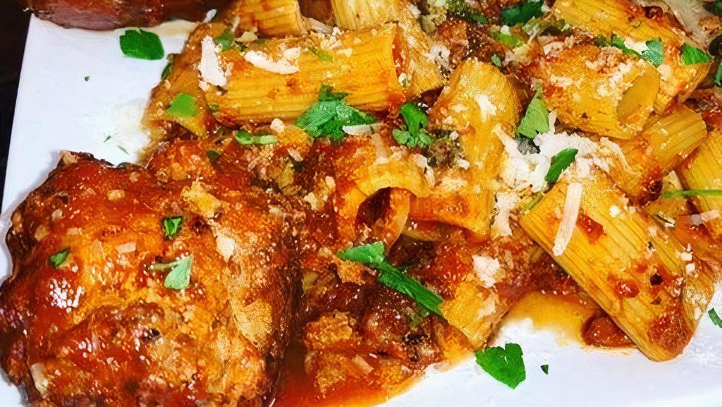 Sunday Gravy · Rigatoni served with a meatball & sausage.  (CONTAINS PORK)
