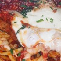 Chicken Parmesan · Breaded chicken cutlet, fresh mozzarella, basil, red sauce