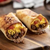 Vaquero Breakfast Burrito · 12 to 14 hour Smoked Brisket, Hash browns, cage free eggs along with our home made salsa. wr...