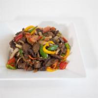 Lega Tibs · Beef sautéed with onions, jalapeno peppers, tomato, and spiced.