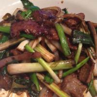 Mongolian Beef + · sliced marinated beef with scallion and onion served with your choice of white or brown rice...