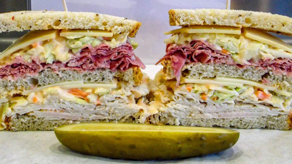 Sloppy Mo! · Double Decker, Double Deli Meat Sandwich Served Cold on Rye Bread. With Coleslaw, Russian Dressing and Swiss Cheese. Choice of Recommended Deli Meat or Choose 2 other Deli Meats