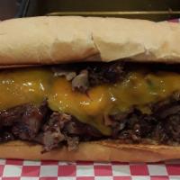 Smoke'N Mo · SMOKED BEEF BRISKET, BBQ SAUCE
CHEDDAR CHEESE ON A HOAGIE ROLL