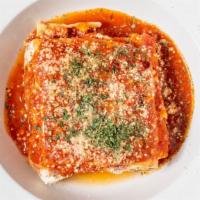 Lasagna · Layers of meat sauce, lasagna noodles and seasoned ricotta cheese. Served with soup of the d...
