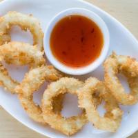Crispy Calamari · Fried calamari rings served with a sweet and spicy chili sauce