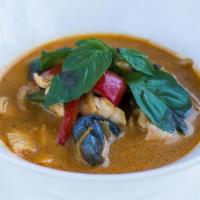Pumpkin Red Curry · Spicy red curry with fresh Thai pumpkin