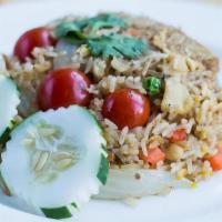 Fried Rice · Fried rice with egg, onions, peas, tomatoes & carrots