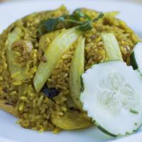 Pineapple Fried Rice · Fried rice with pineapple, raisins, cashews, onions & curry powder