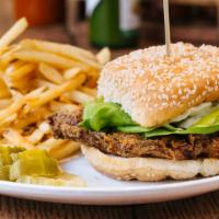 Buttermilk Fried Chicken Sandwich · Bibb lettuce, pickles, and mayo on a seeded bun. Served with fries. Add cooper sharp, chedda...