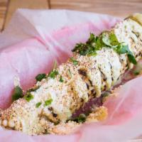 Grilled Mexican Corn · Cilantro lime aioli and smoked cotija cheese.