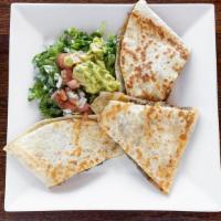 Quesadilla Jalisco · Stuffed with your choice of grilled chicken, steak or combination of both & cheese, served w...