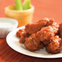 Buffalo Chicken Wings · Your choice of mild, hot, sweet 'n spicy or sriracha. Served with celery sticks and blue che...