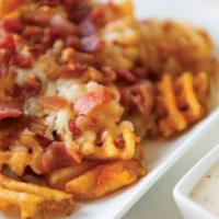 Loaded Waffle Fries · Cheese and bacon served with side of ranch dressing.