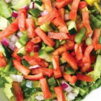 Garden Salad · Lettuce, tomatoes, cucumbers, peppers, onions and pepperoncini.