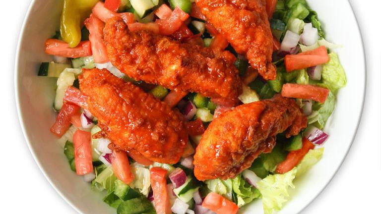 Buffalo Chicken Salad · Hand-breaded, fresh chicken tenders tossed in buffalo sauce (mild, hot or sweet 'n spicy) on a garden salad.