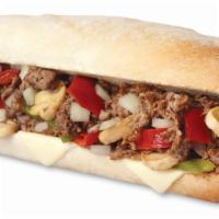 Steak Bomb · Shaved top grade sirloin, peppers, mushrooms, onions and cheese.
