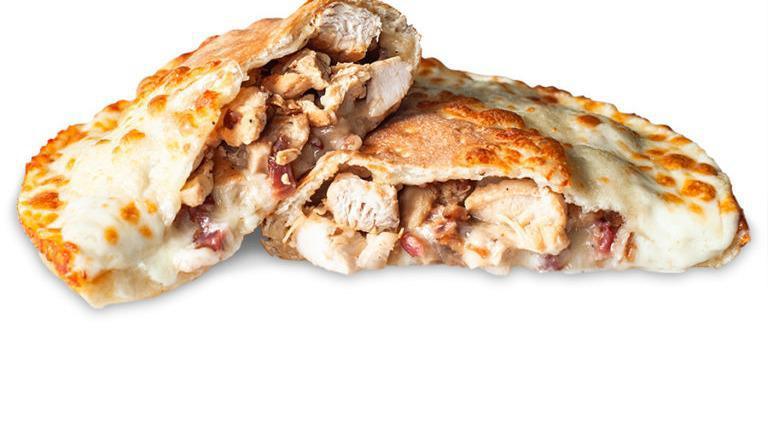 Grilled Chicken Bacon Ranch Calzone · White pizza with fresh chicken, bacon and buttermilk ranch.