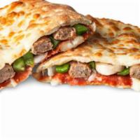 The Ultimate Calzone · Peppers, onions, mushrooms, sausage and pepperoni.