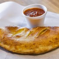 Large Cheese Calzone · Our calzones are loaded with mozzarella cheese (and any other topping of your choice) and se...