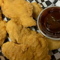 Chicken Fingers · 100% white meat chicken tenders. Served with a dip sauce of your choice.