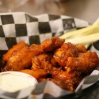 Bone In Jumbo Wings · Jumbo bone-in party wings served either house-seasoned or tossed in the sauce of your choice...