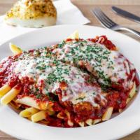 Chicken Parmigiana · Hand breaded chicken tenderloin topped with house-made marinara and melted mozzarella cheese.
