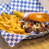 New Black & Blue Burger · 100% angus burger with crumbled blue cheese, hickory-smoked bacon, sautéed mushroom and ranc...