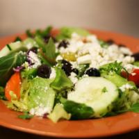 Greek Salad · Our garden salad with kalamata olives and feta cheese. Served with Greek dressing and pita b...