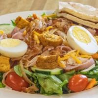 Chef Salad · Our garden salad with ham, turkey, bacon, egg, cheddar and jack cheese and croutons. Served ...