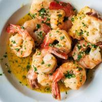 Shrimp Scampi  · Jumbo shrimp sautéed in garlic lemon wine sauce.