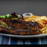 Churrasco · 16-18oz Steak, Chimichurri Sauce , French fries, Rice