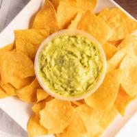 Guacamole Mexicano · A blend of ripe avocados served with chips.