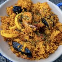 Paella Las Placitas · Valencia's famous Spanish rice dish with shrimp, scallops, clams, mussels, and squid.