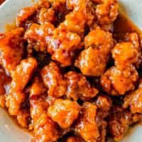 General Tso'S Chicken · Spicy. Battered deep-fried chunks of chicken stirred-fried in a hot and spicy sweet tomato f...