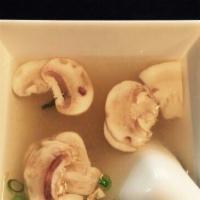 Miso Mushroom Soup · With mushroom, seaweed, tofu and scallions. Gluten-free.