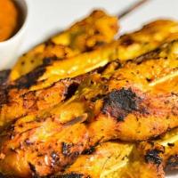 Chicken Satay (3) · Marinated curry chicken  served with spicy mayo sauce