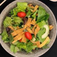 Simple Salad · Orange segments, crisped wonton skins, ginger vinegarette