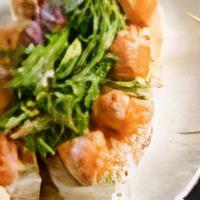 Irene'S Paradise Roll · Spicy crab, avocado and shrimp tempura, topped with spicy crunchy salmon, yuzu garlic sauce ...