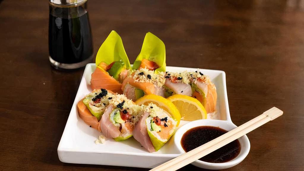 Green Lantern Roll · Salmon, kani, avocado, soy paper, topped with salmon, yellowtail and shaved bonito sesame seed, served with spicy mayo, momiji, wasabi yuzu.