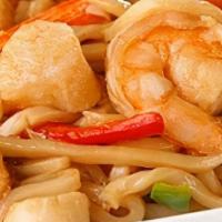 Yaki Udon · Japanese udon noodle pan fried with shrimp, crab sticks, scallops, fish cake and seasonal ve...