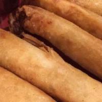 Lumpiang Shanghai · It comes with 10 pieces. Ground pork with finely chopped vegetables wrapped in an egg roll a...