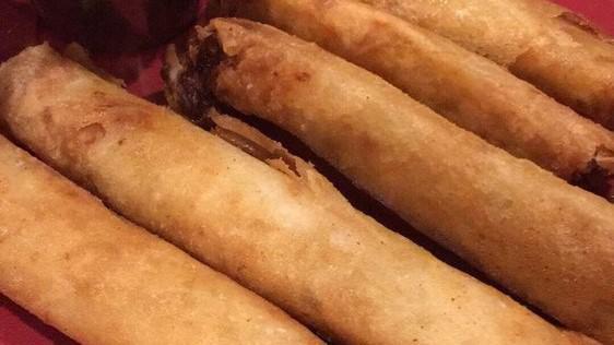 Lumpiang Shanghai · It comes with 10 pieces. Ground pork with finely chopped vegetables wrapped in an egg roll and deep-fried.